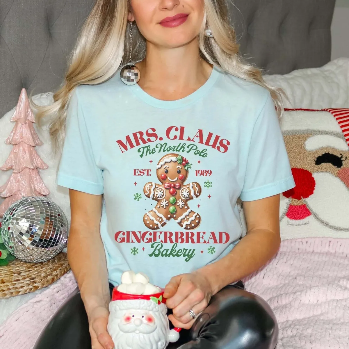 Mrs. Claus Gingerbread Bakery Wholesale Bella Graphic Tee - Fast Shipping